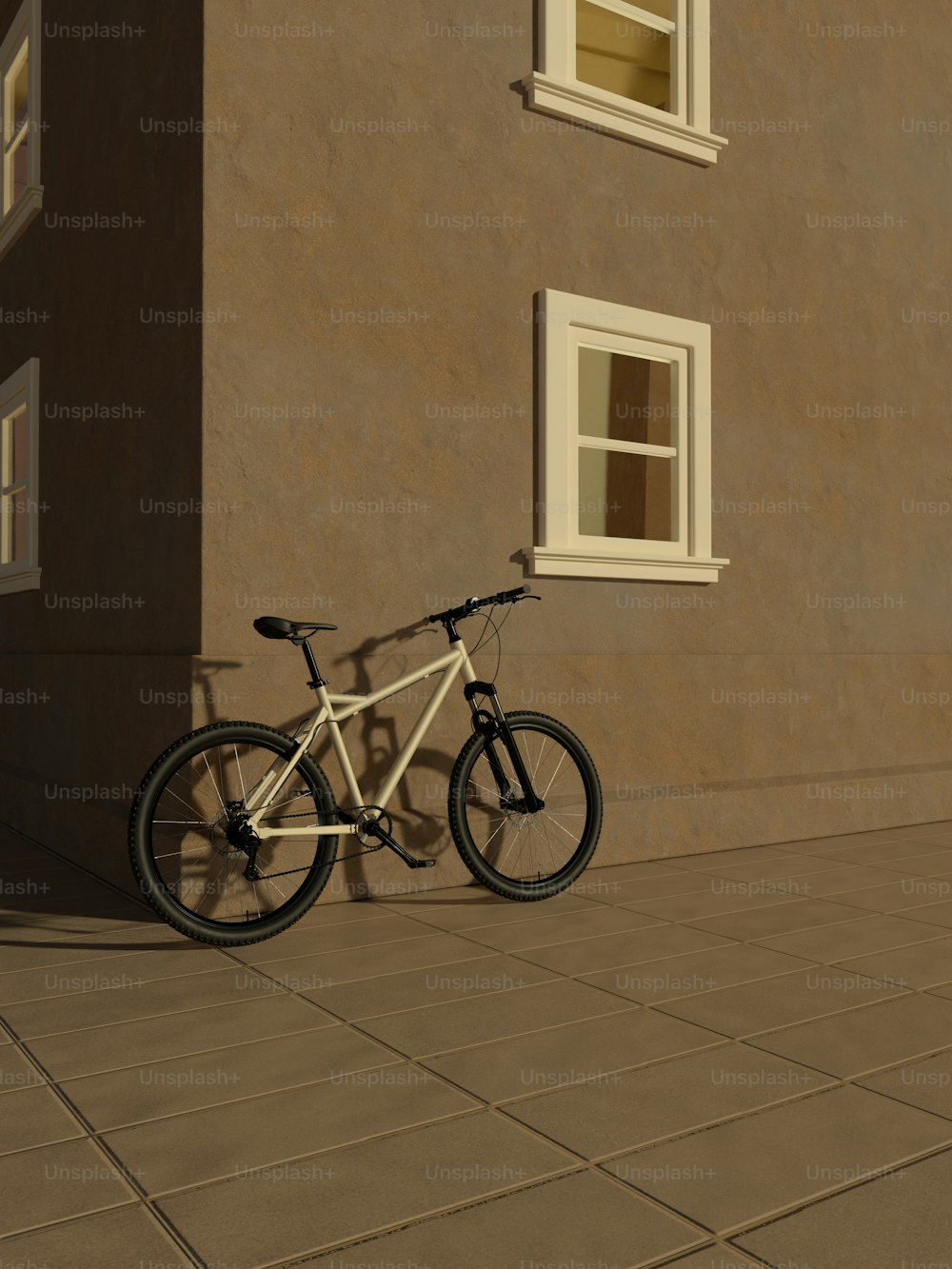 Ein Fahrrad lehnt an einem Gebäude auf einem Bürgersteig