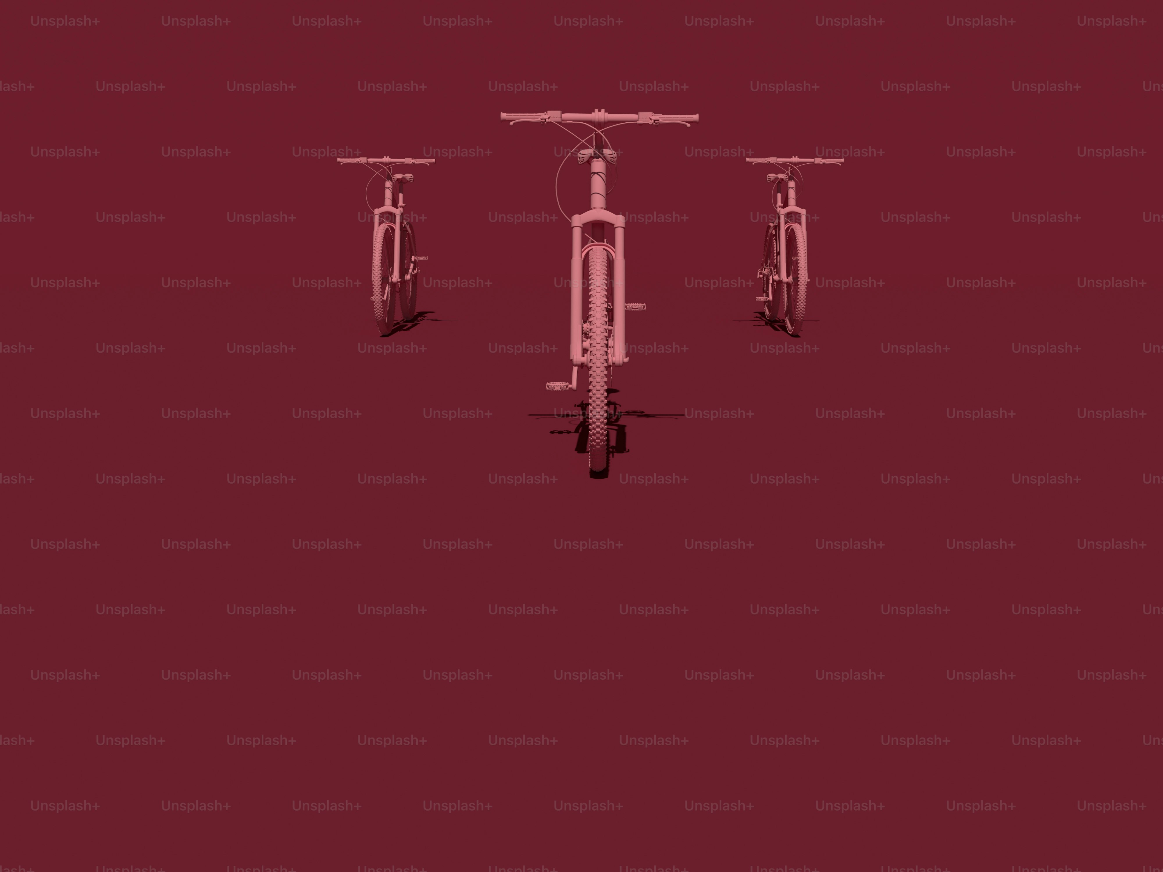 three bicycles are shown against a red background