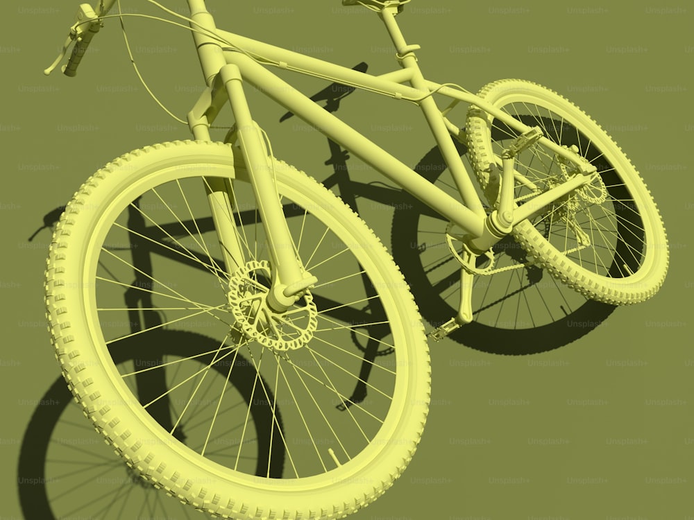 a yellow bicycle is shown on a green background