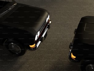 a couple of black trucks parked next to each other