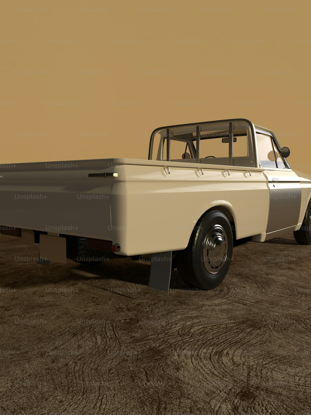 a white pickup truck parked on top of a dirt field