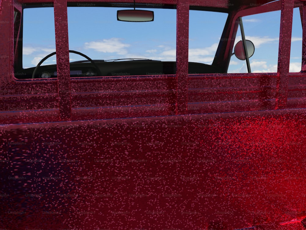 a red pick up truck parked in a parking lot