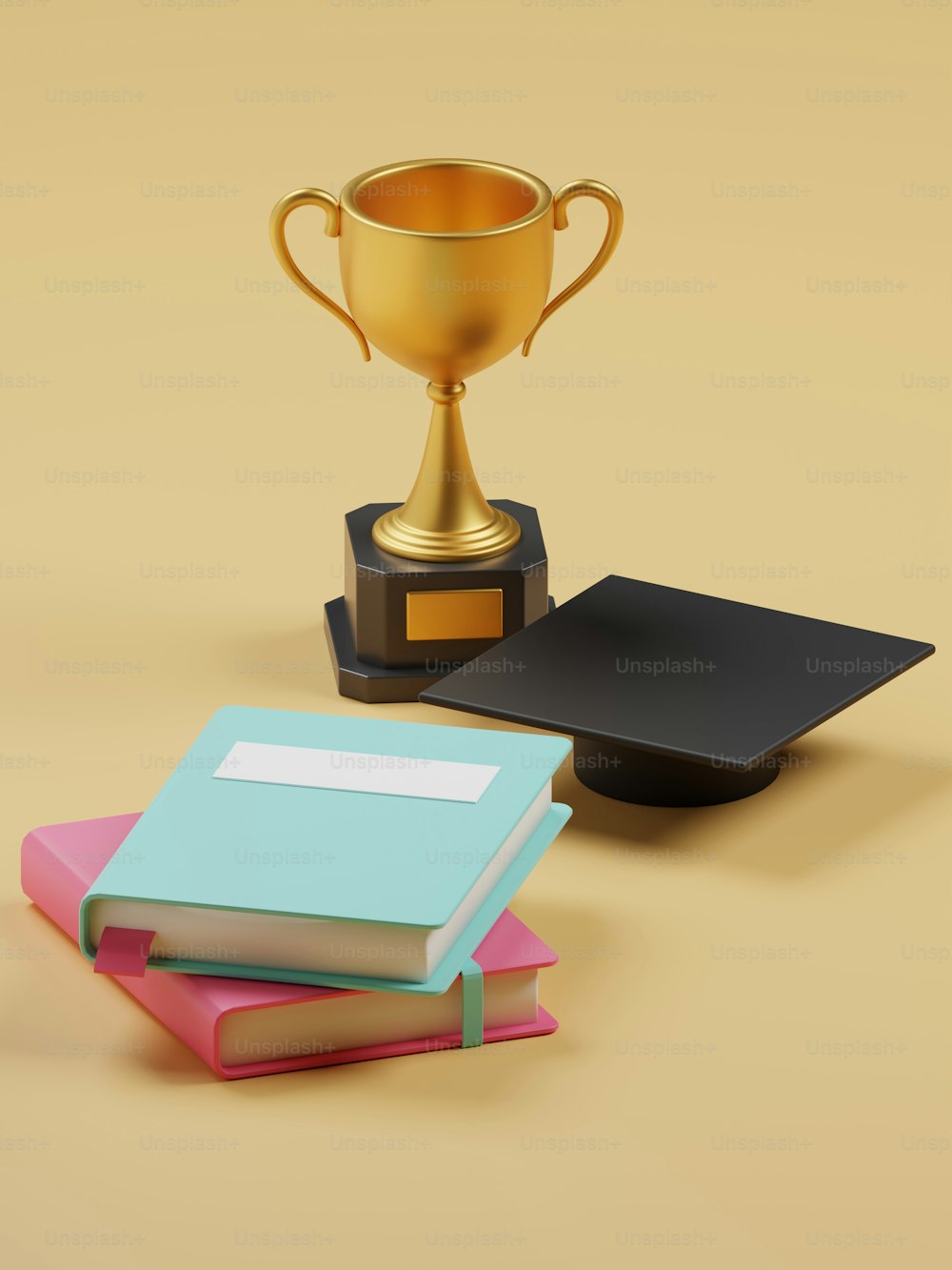 a gold trophy, a book, and a book on a table
