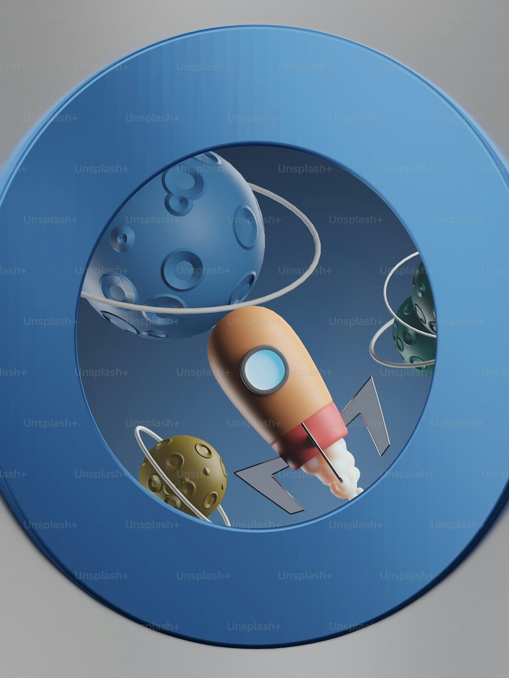 a blue button with a picture of a rocket and planets