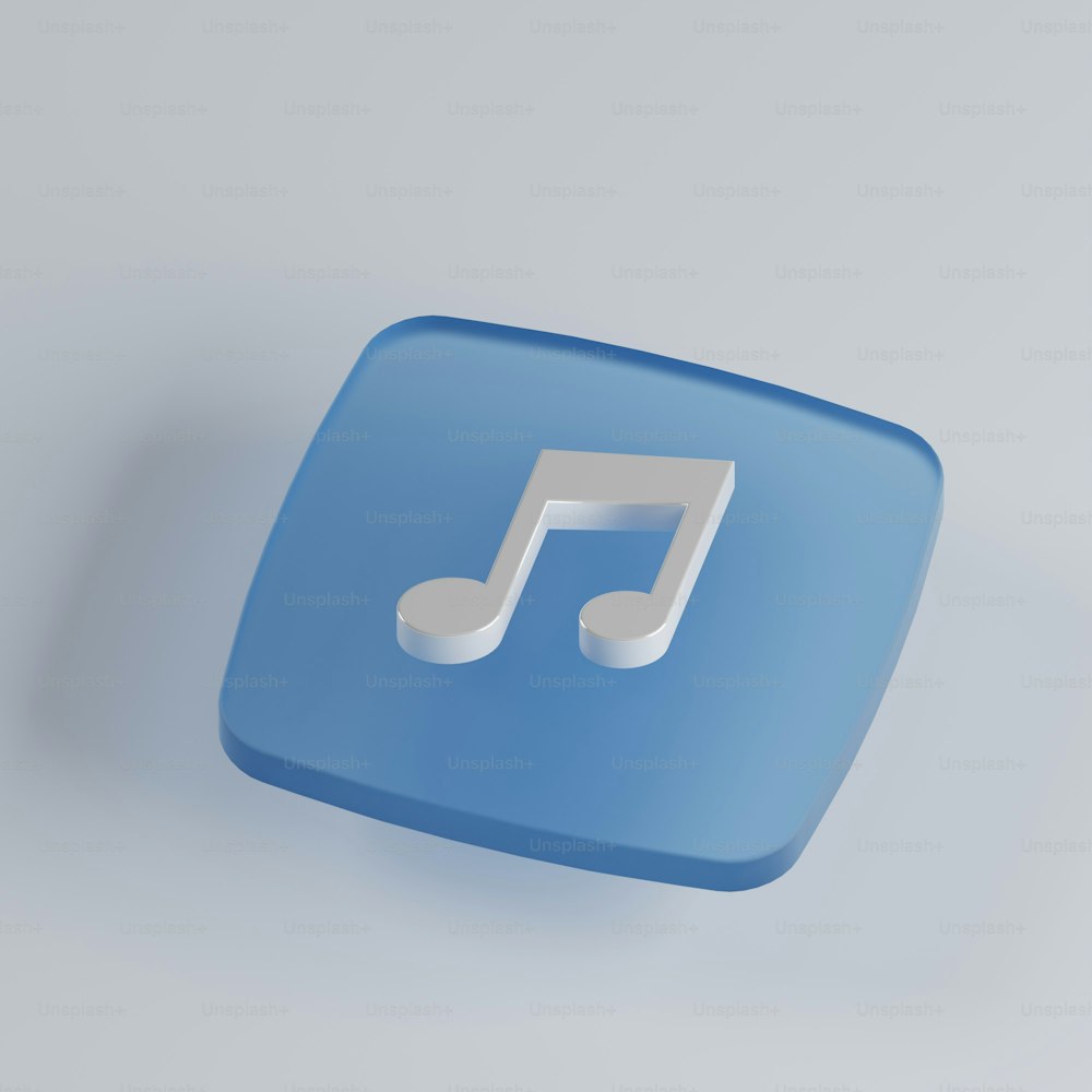 un botón cuadrado azul con una nota musical