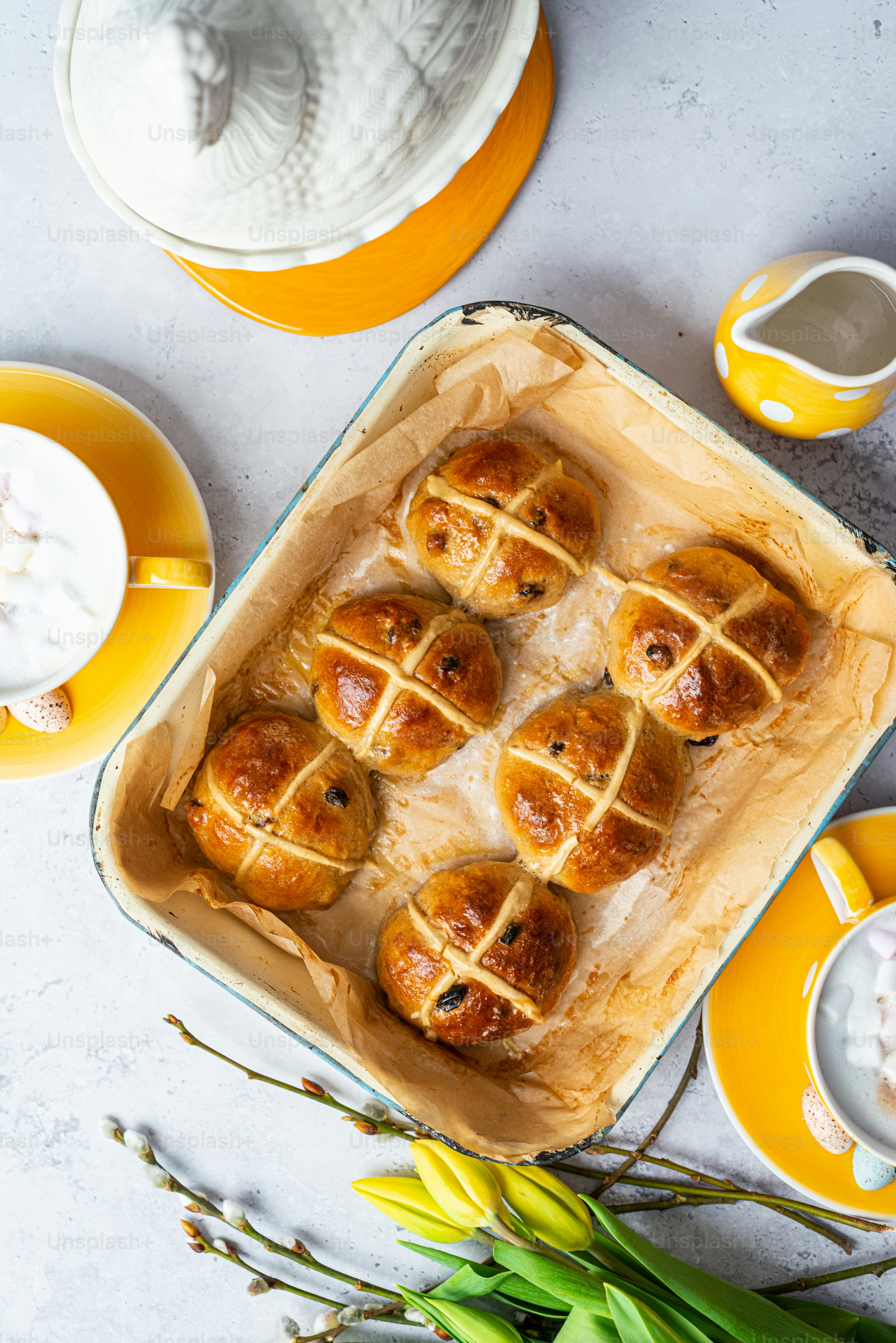 a baking dish filled with hot cross buns