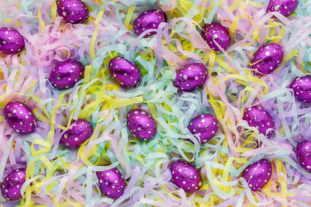 a close up of a bunch of candy eggs
