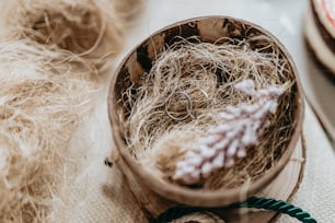 a wooden bowl filled with lots of hair