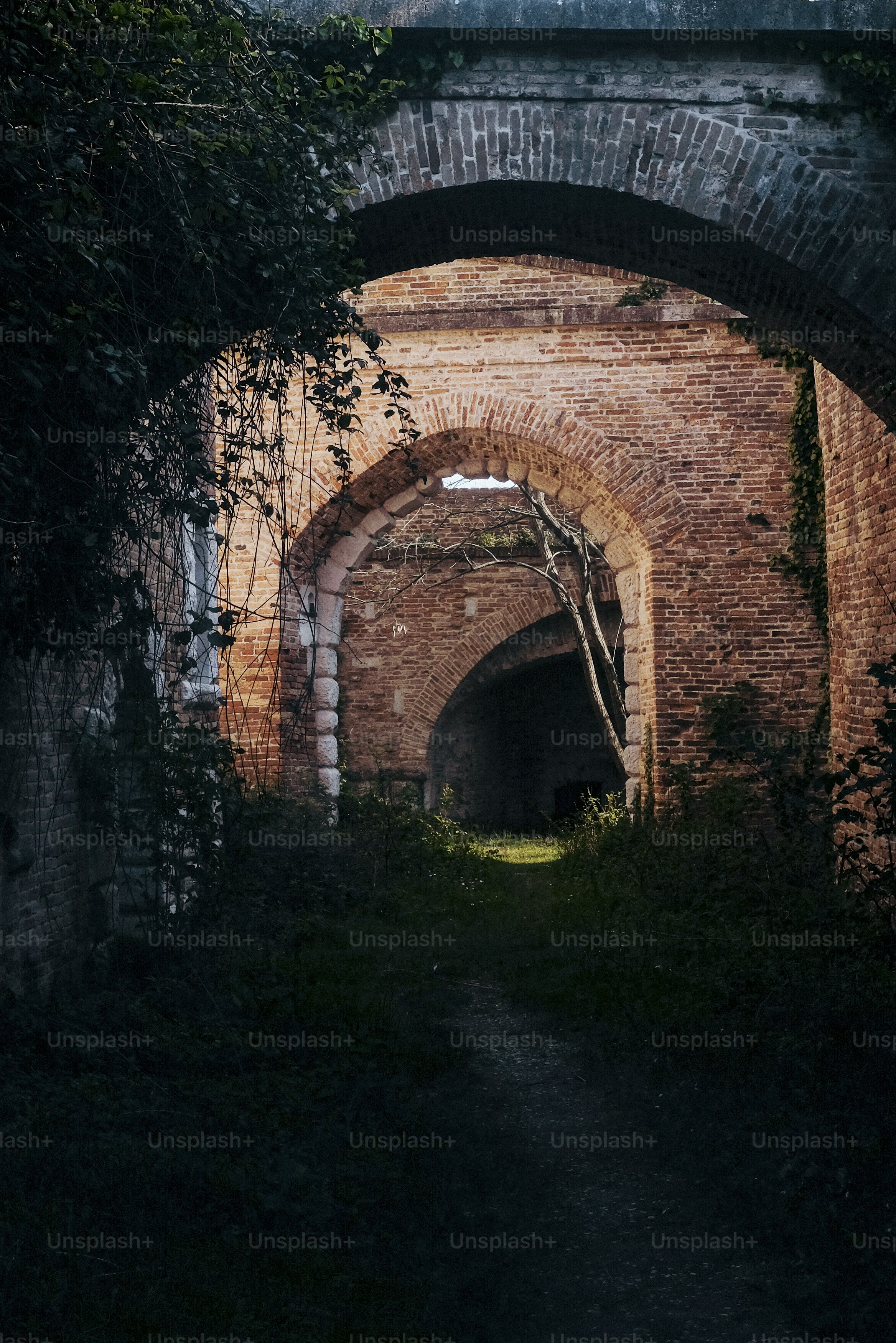 a dark tunnel with a light at the end