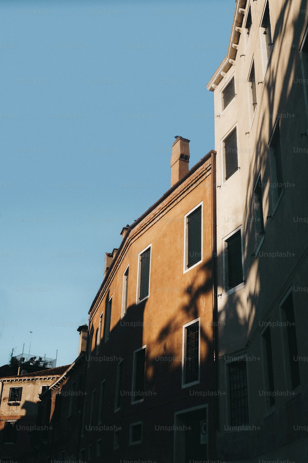 a building with a clock on the side of it