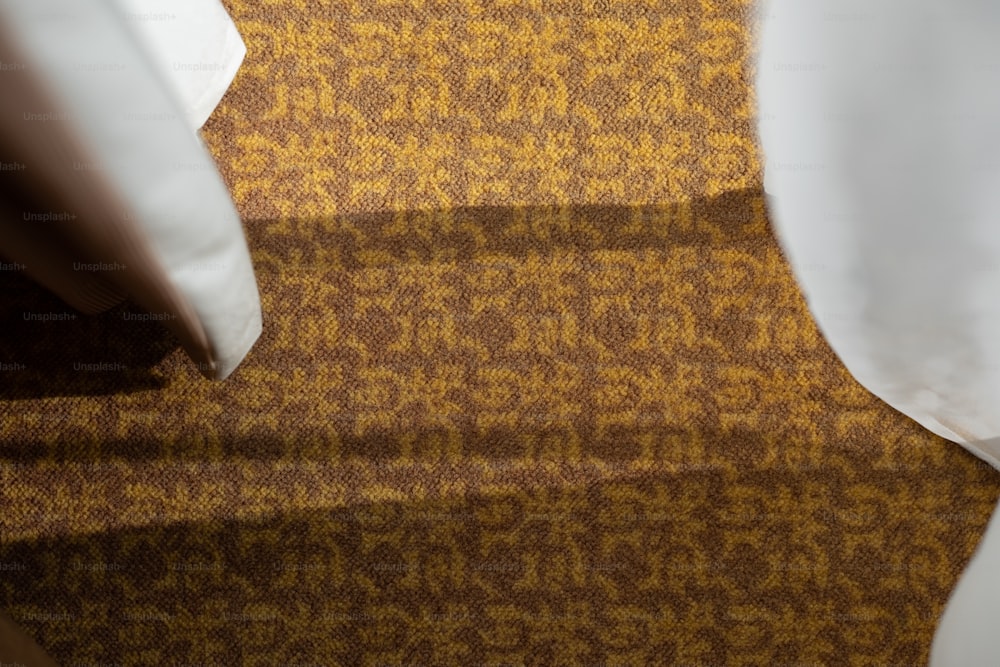 a close up of a piece of paper on a carpet