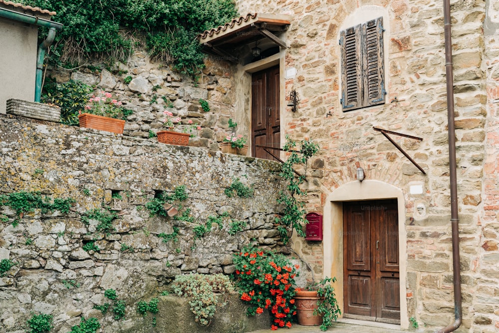 a stone building with a door and window