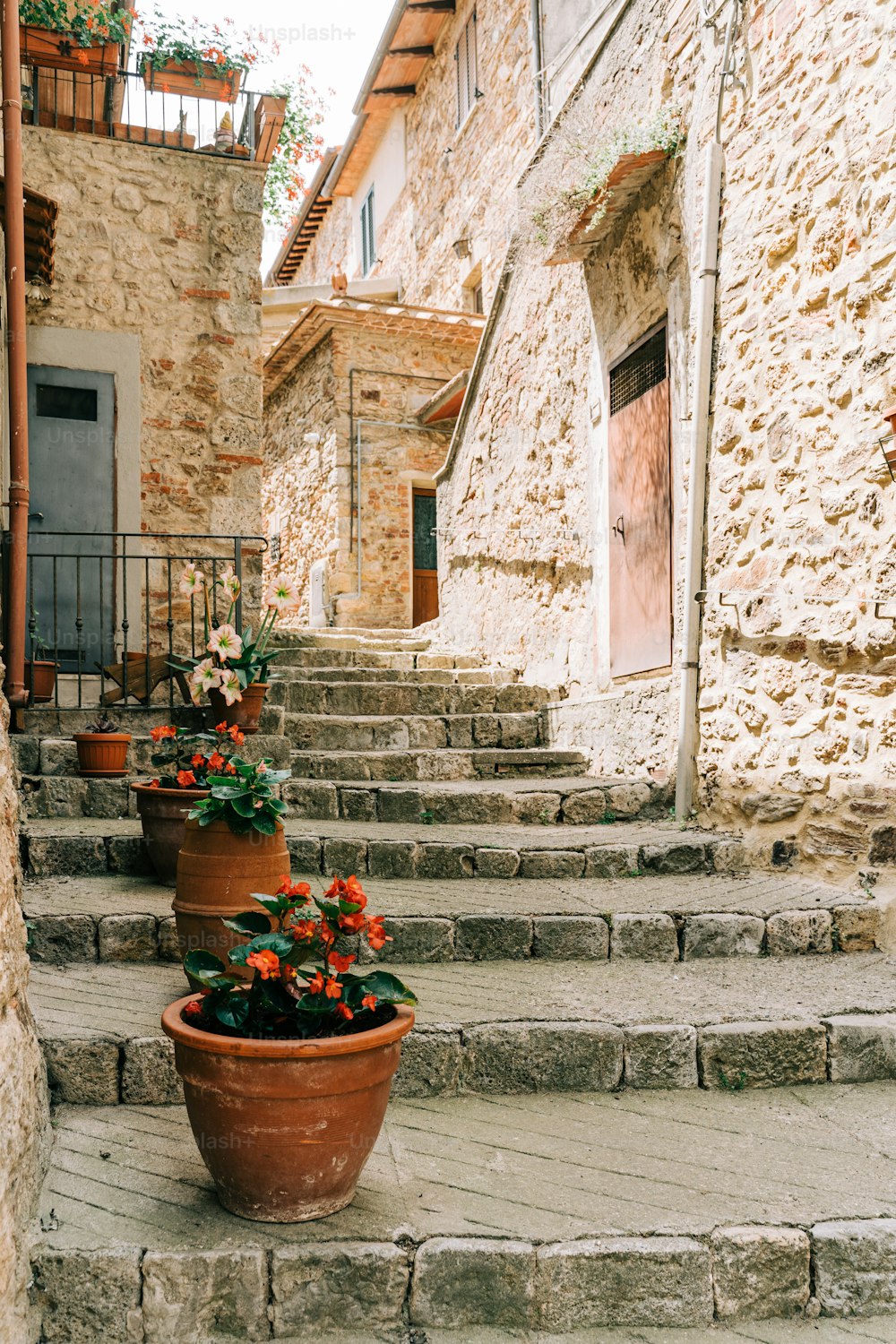 a couple of pots that are on some steps