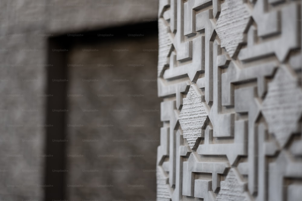 a close up of a wall with a pattern on it