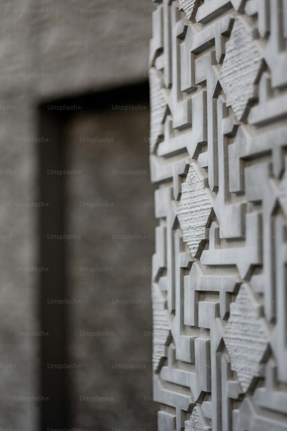 a close up of a wall with a pattern on it