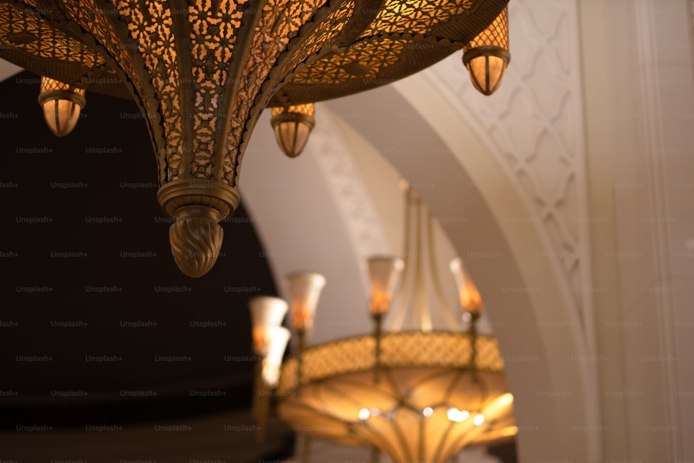 a chandelier hanging from a ceiling in a room