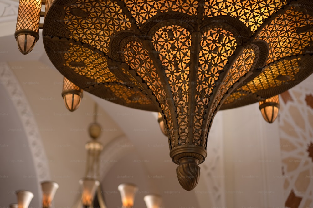 a chandelier hanging from a ceiling in a room