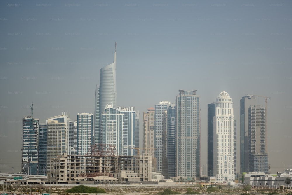 a view of a city with tall buildings