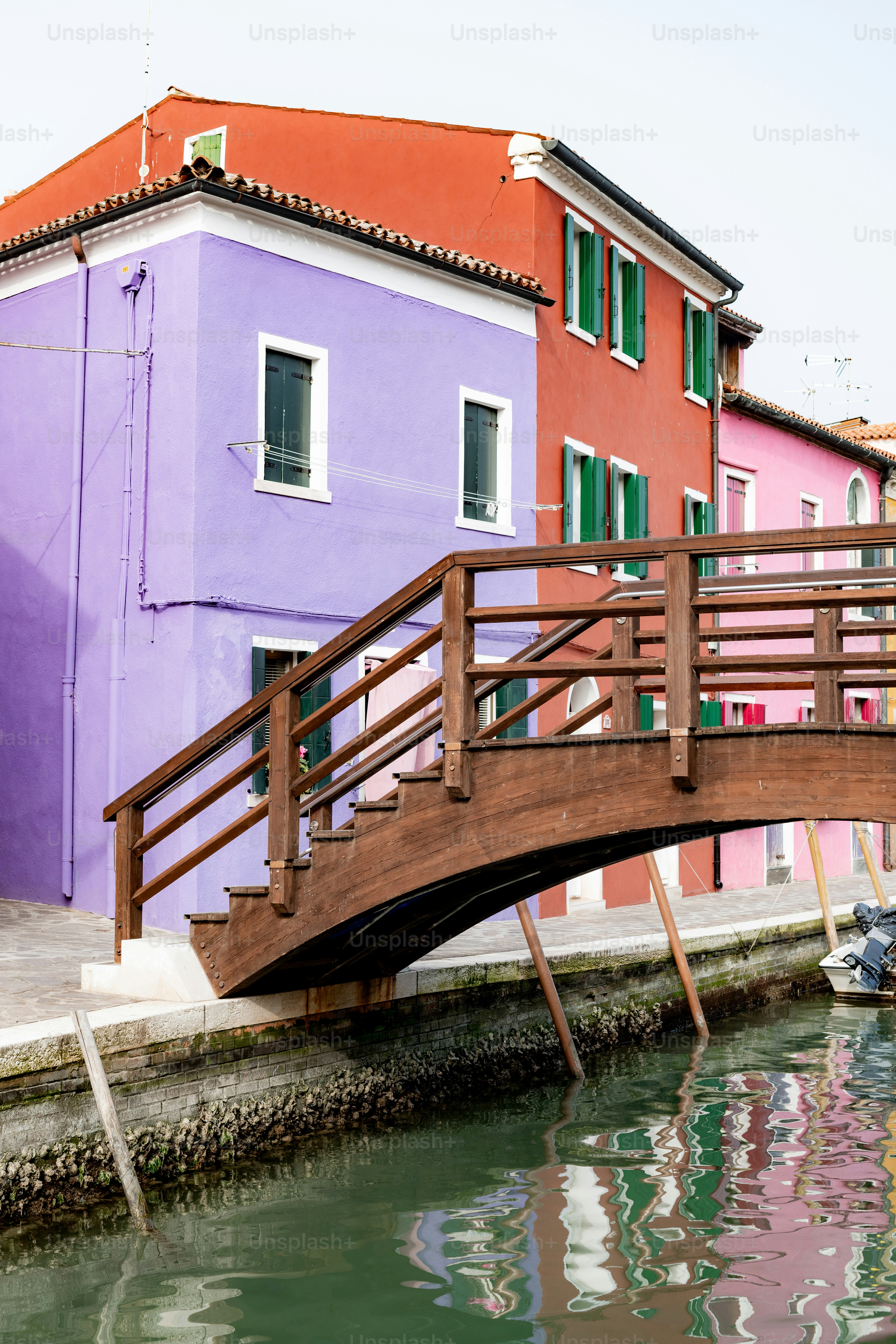 a wooden bridge over a body of water