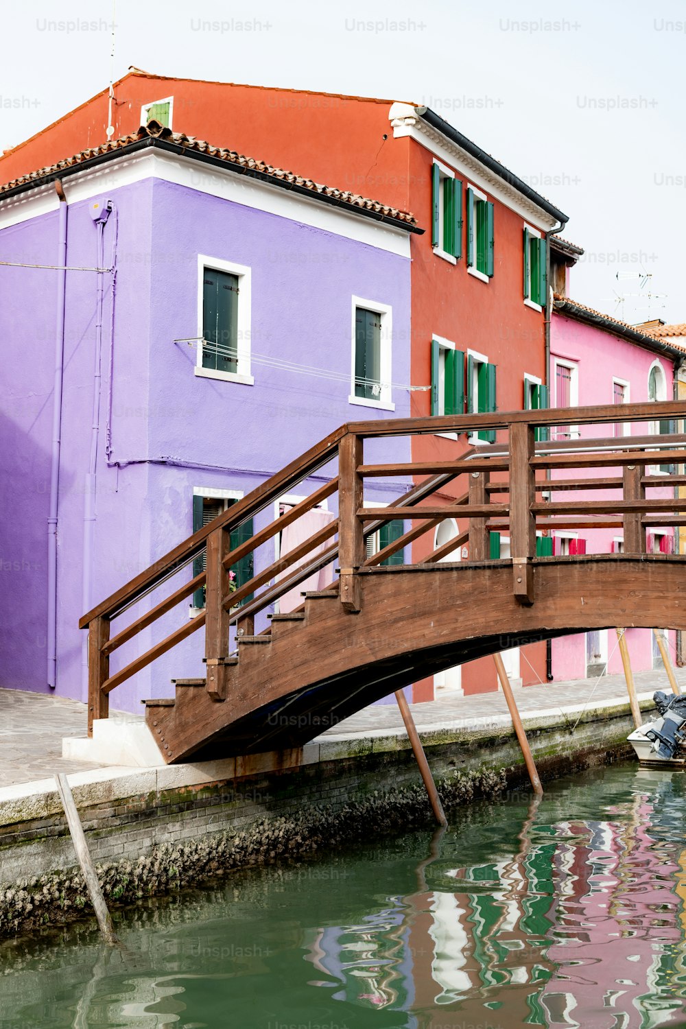 a wooden bridge over a body of water