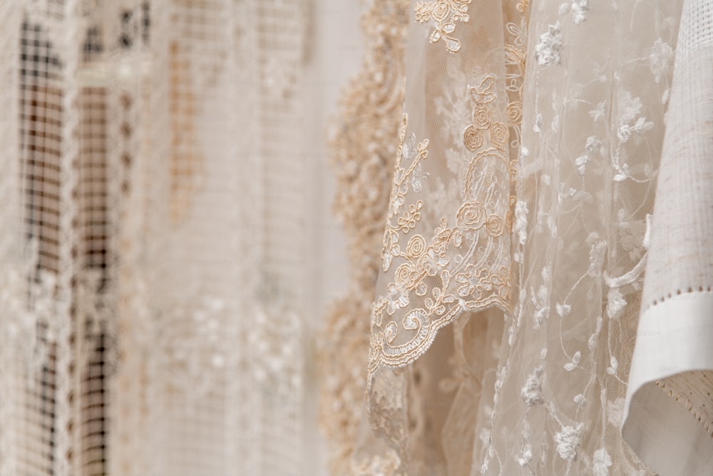 a close up of a curtain with lace on it