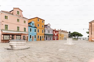 a row of colorful buildings sitting next to each other