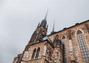 a tall building with a clock on it's side