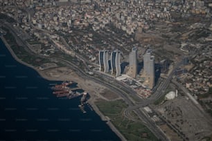 an aerial view of a city and a body of water