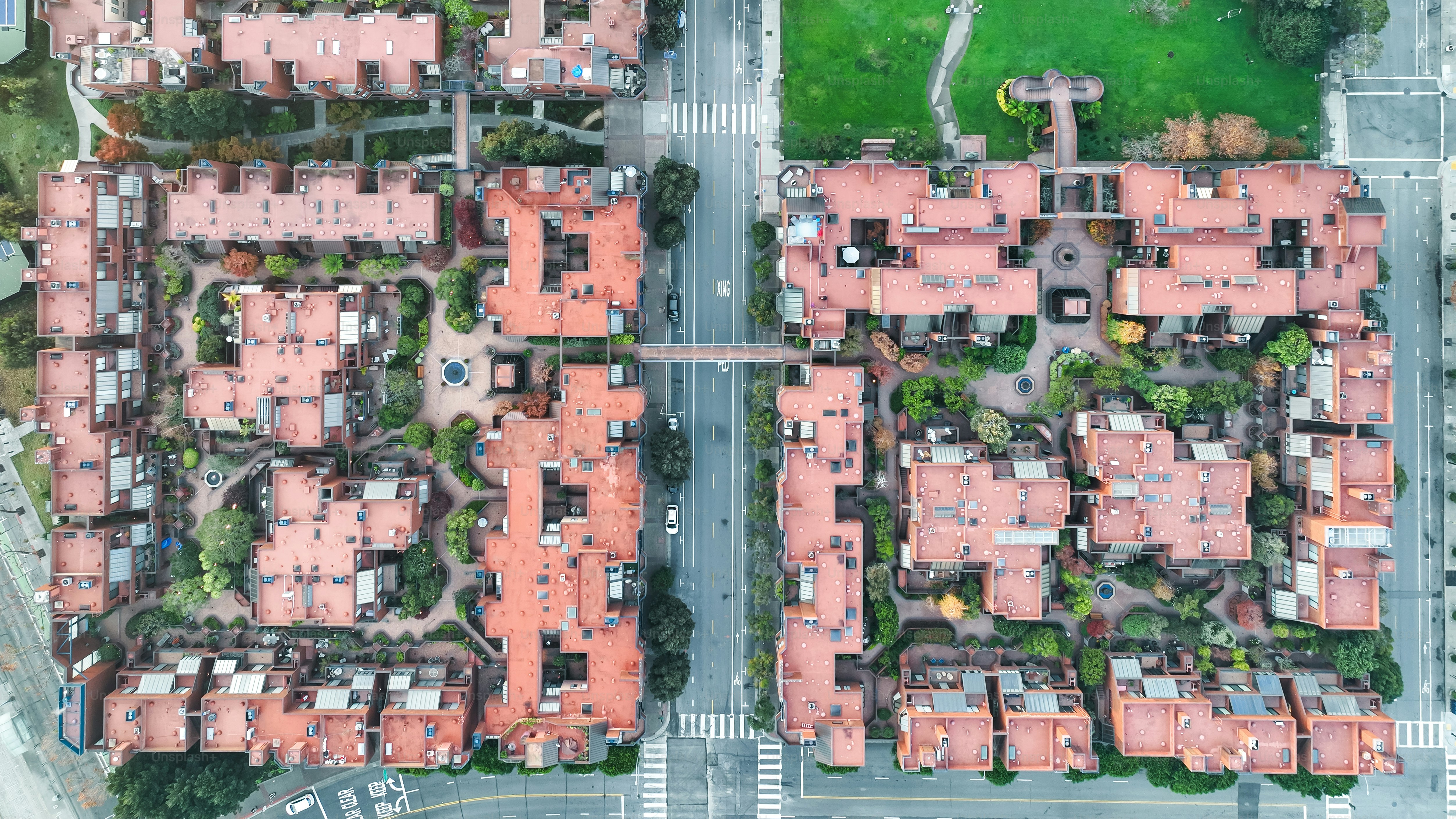 a bird's eye view of a city with lots of houses
