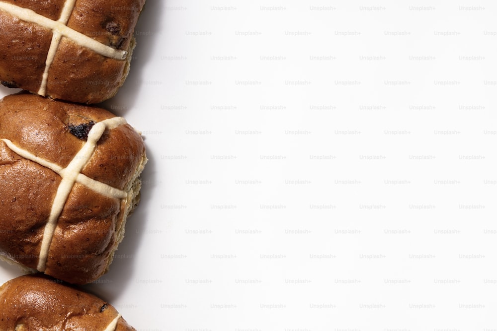 a group of hot cross buns sitting on top of each other