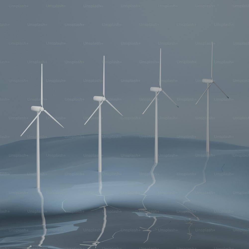a group of wind turbines floating on top of a body of water