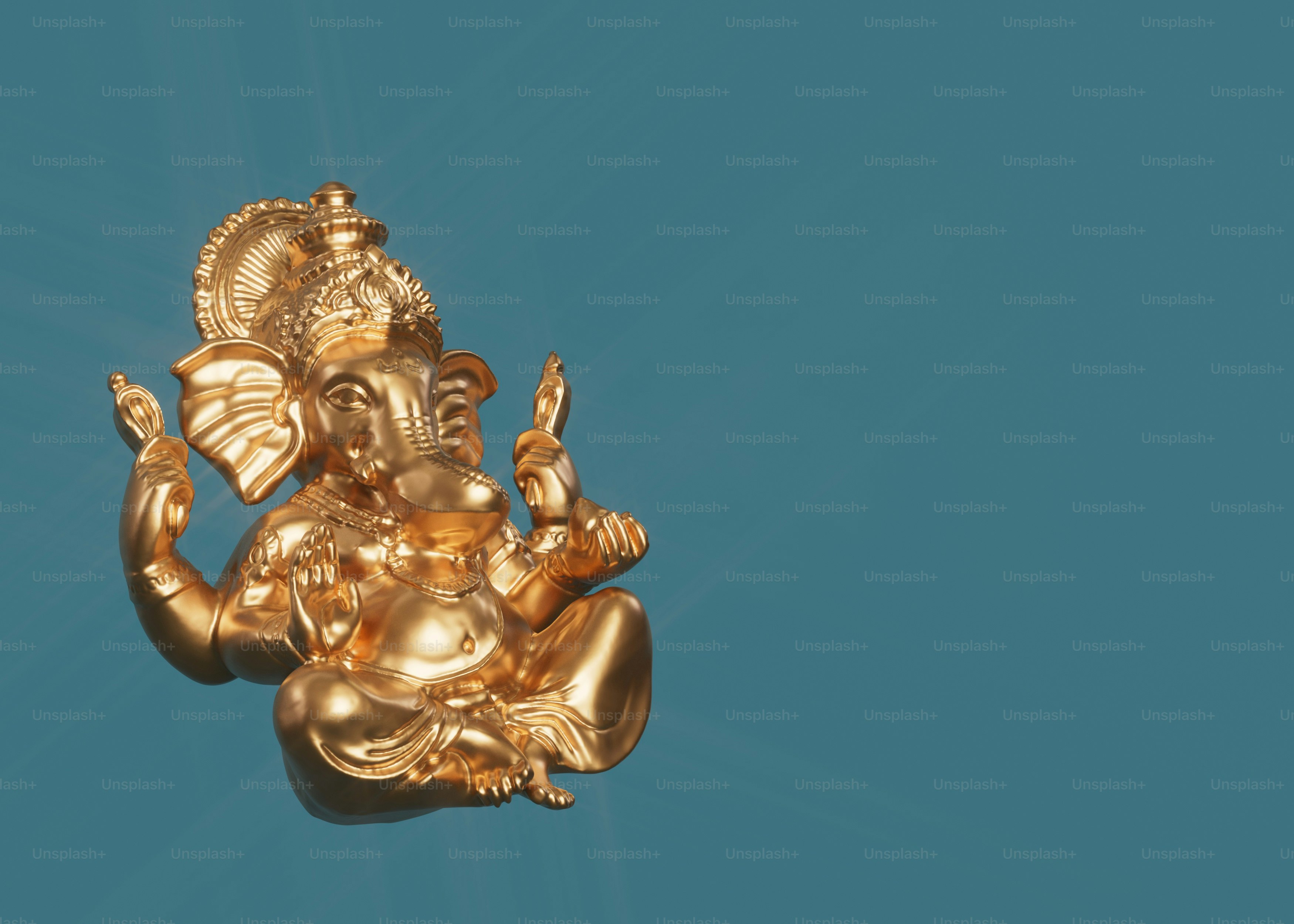 a golden statue of an elephant on a blue background