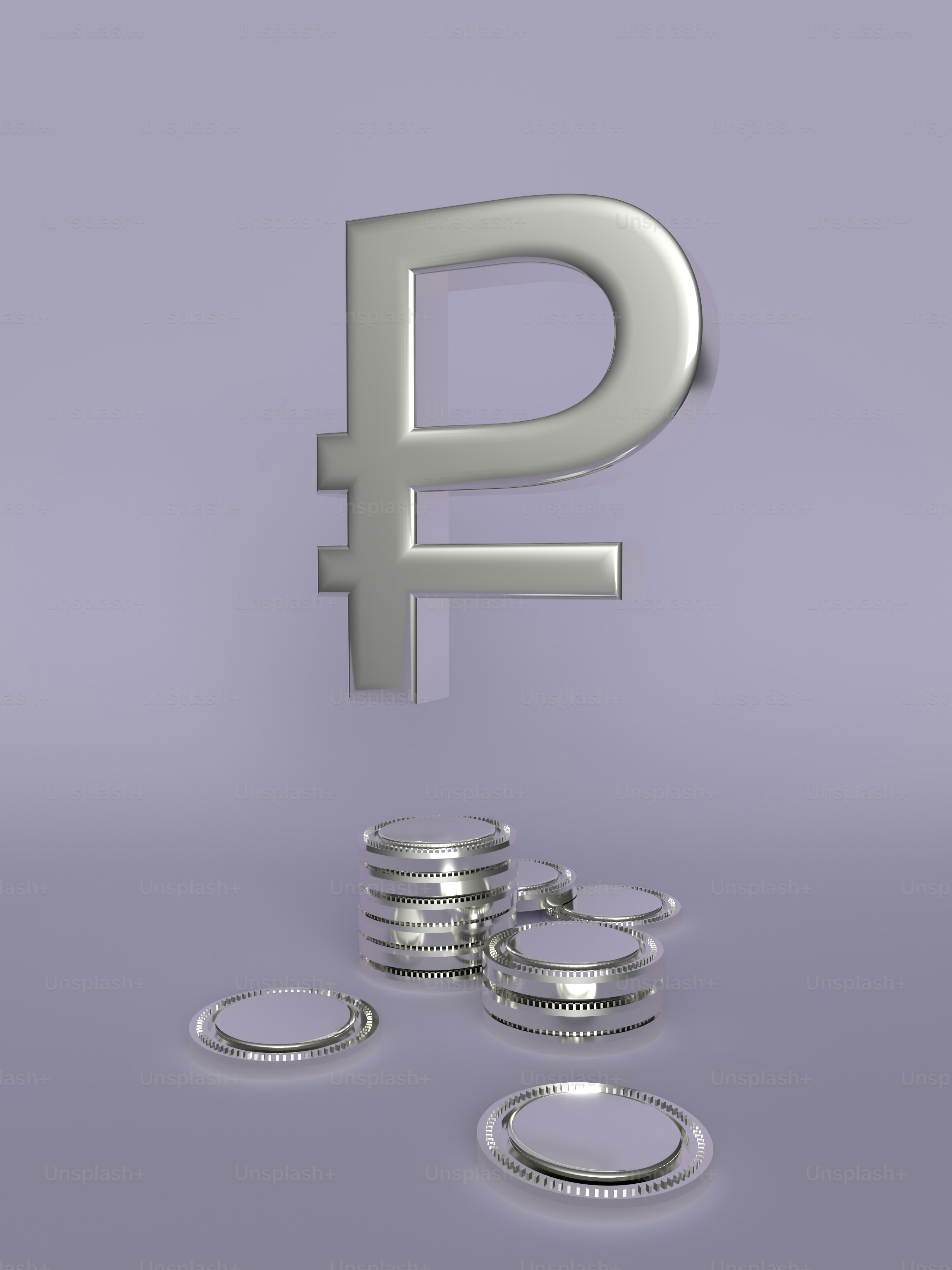 a pile of silver coins sitting next to a pound sign