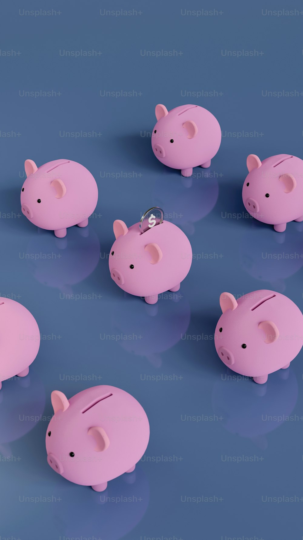 a group of pink piggy banks sitting next to each other