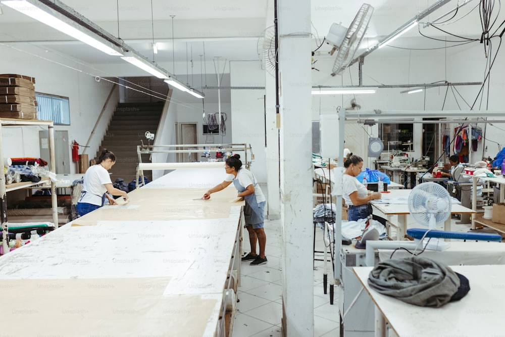 a group of people working in a factory