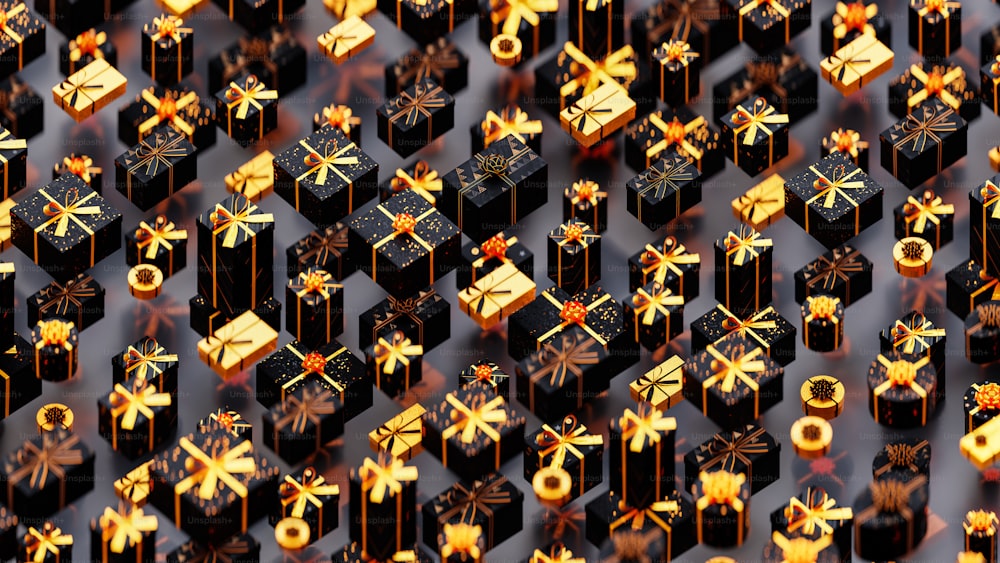 a group of black and gold gift boxes