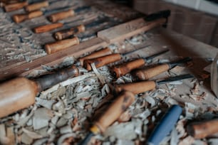 a bunch of wood shavings are laying on a table