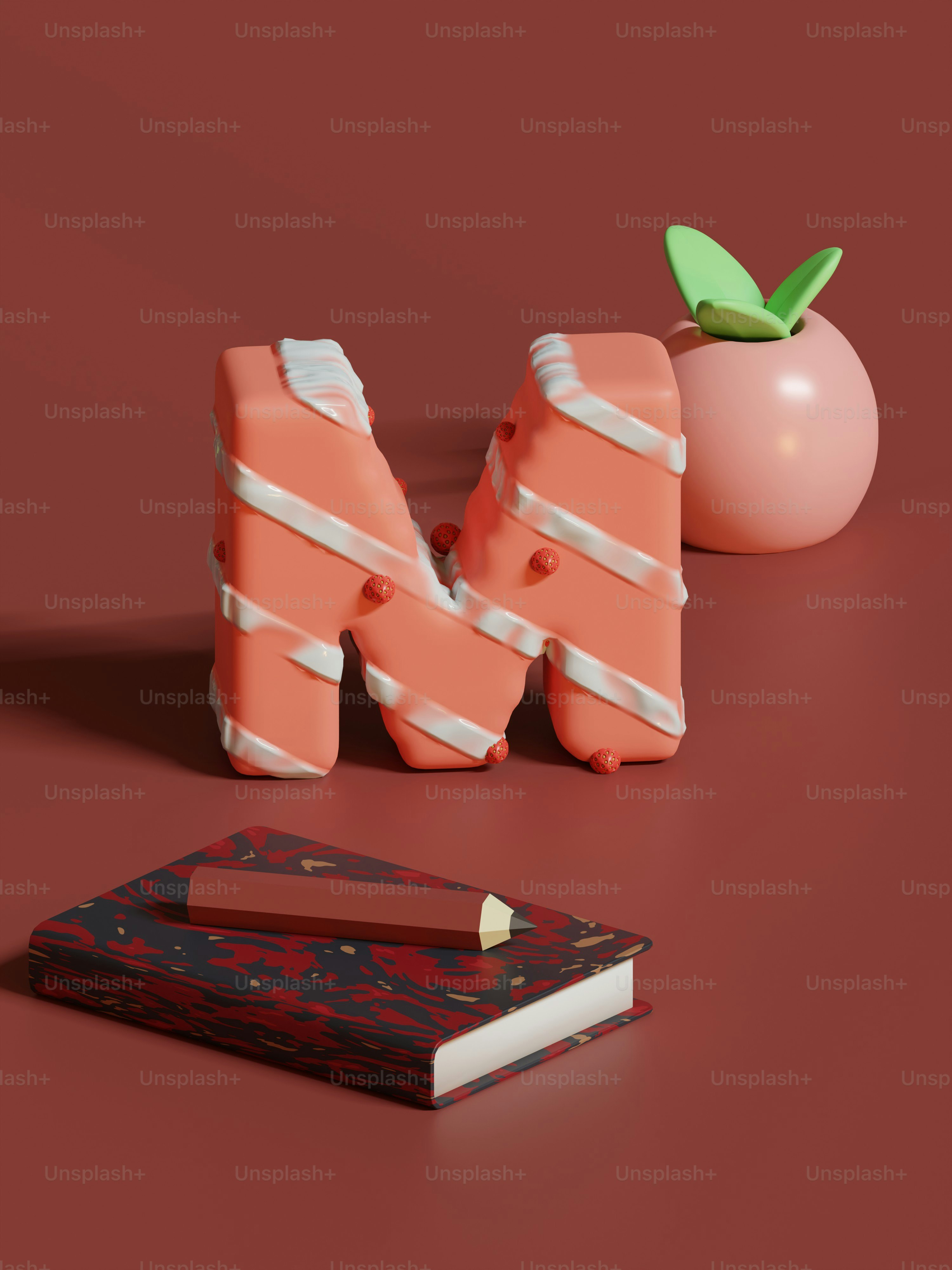 Ein Buch, ein Bleistift und ein Apfel auf einem Tisch