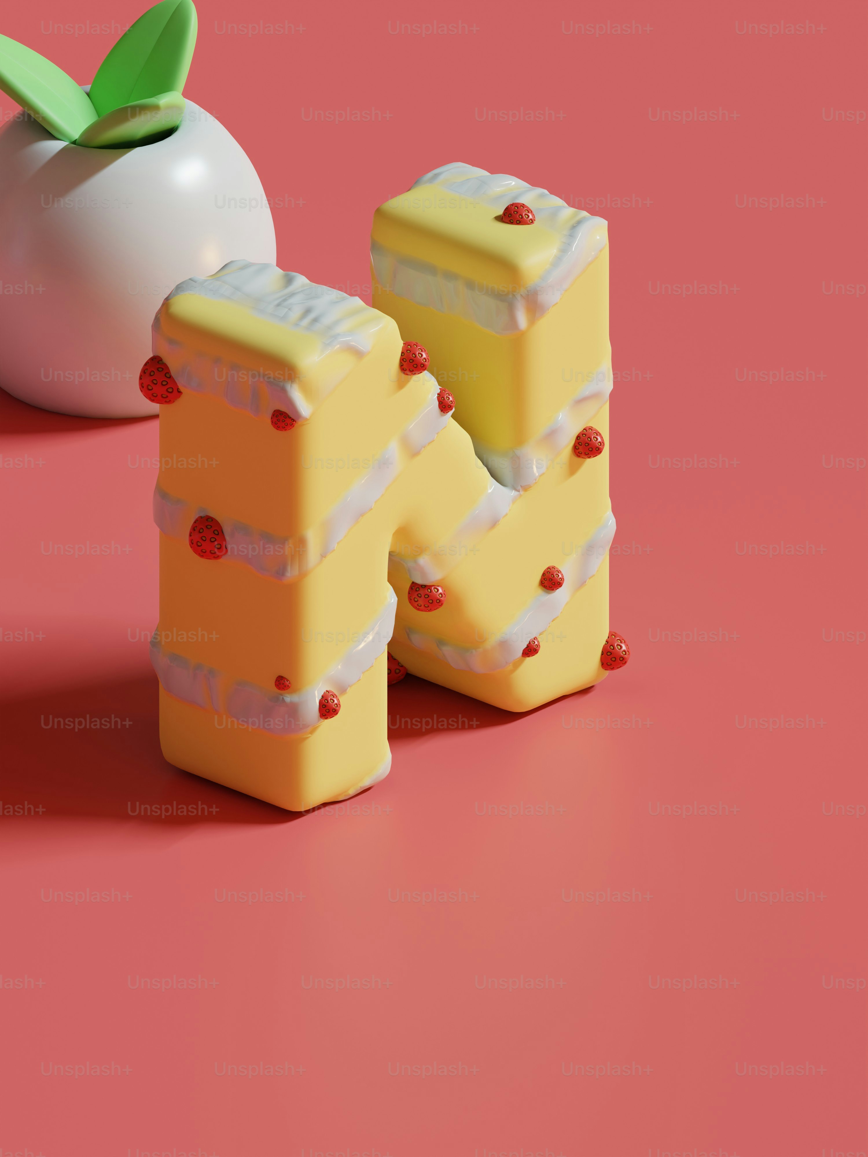 a piece of cake next to an apple on a pink surface