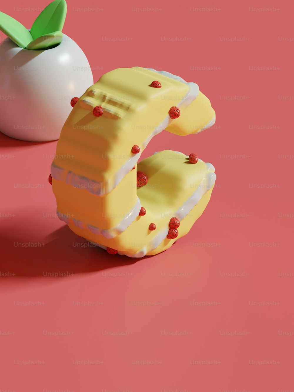 a piece of cake next to an apple on a pink surface