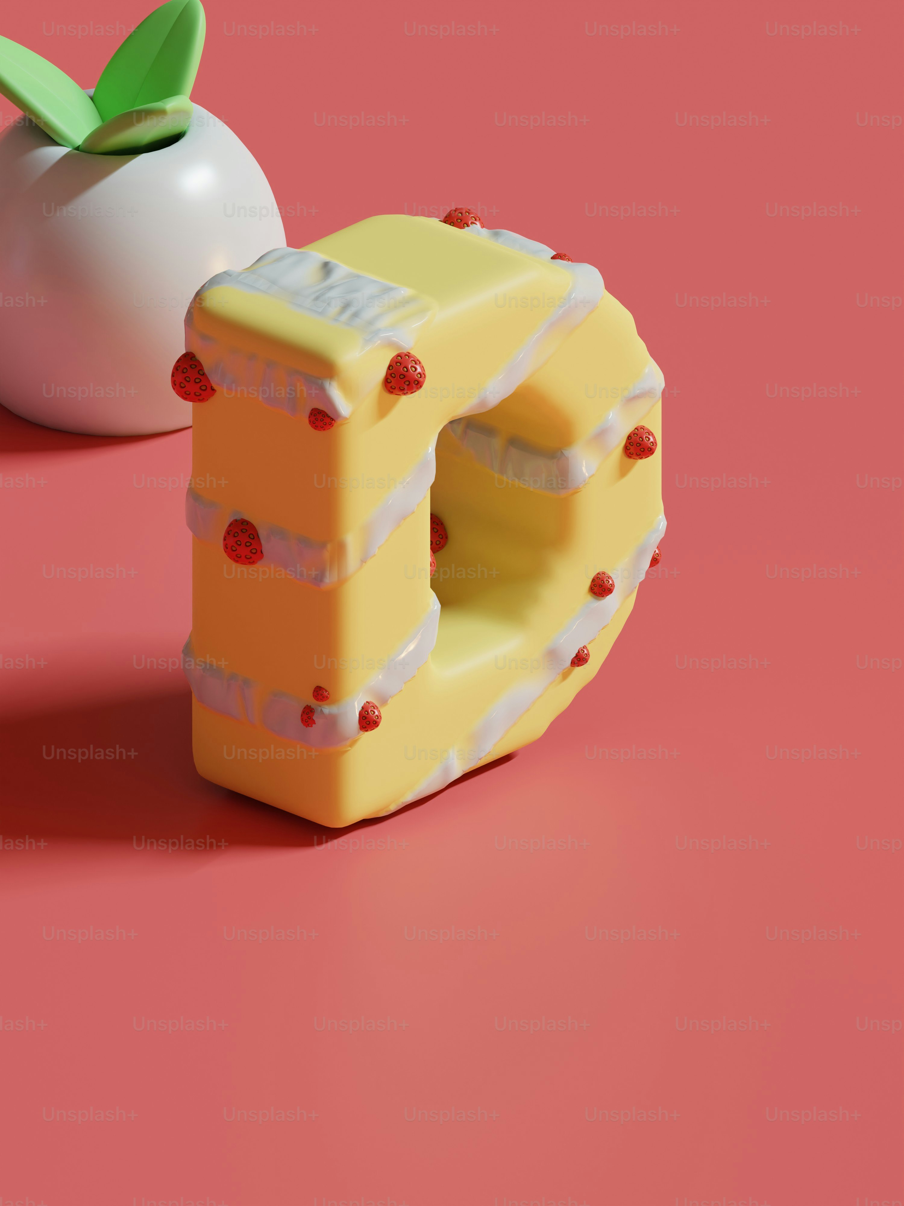 a piece of cake next to an apple on a pink surface