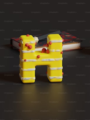 a yellow toy that is sitting on a table