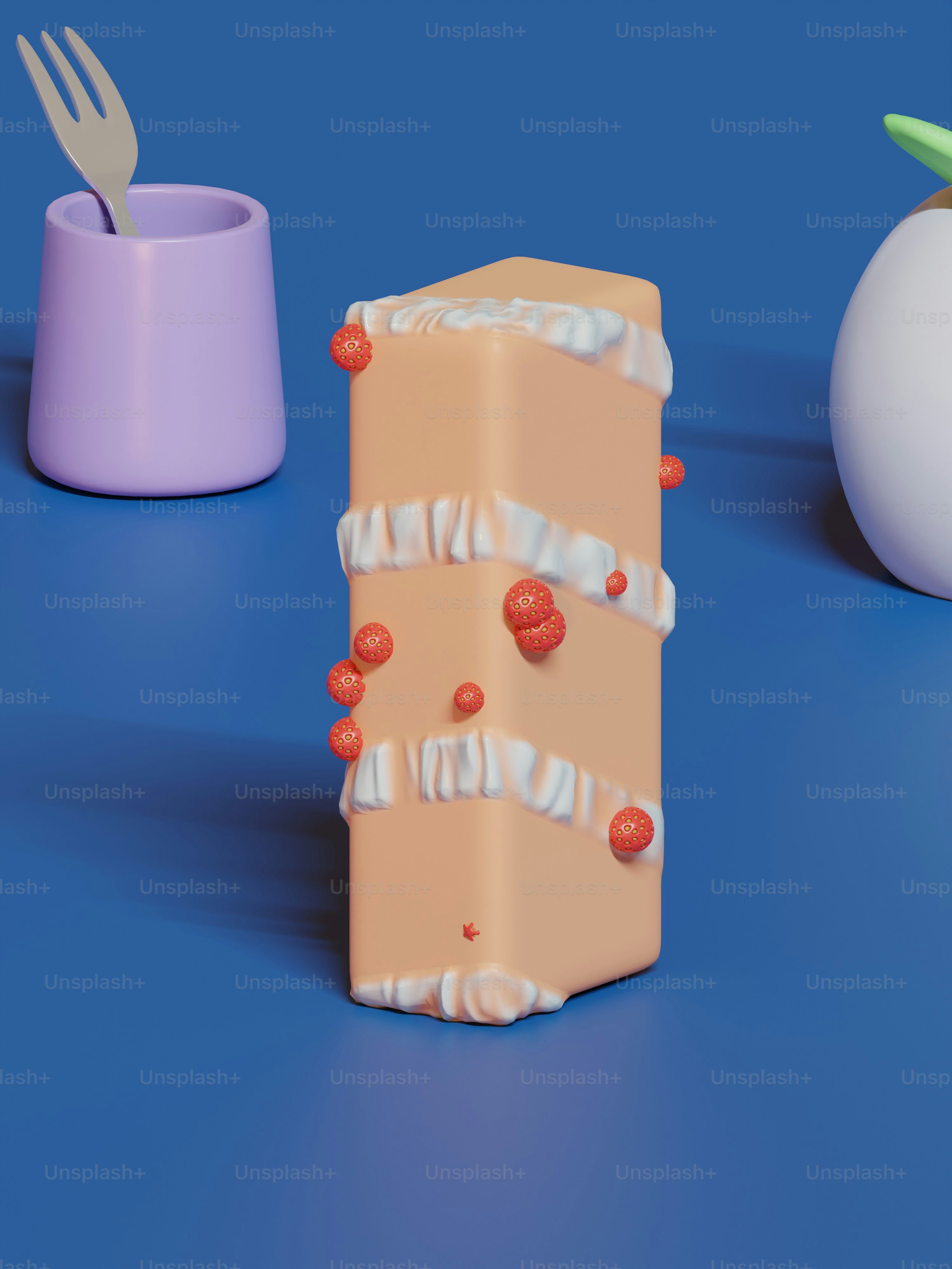 un morceau de gâteau posé sur une table bleue