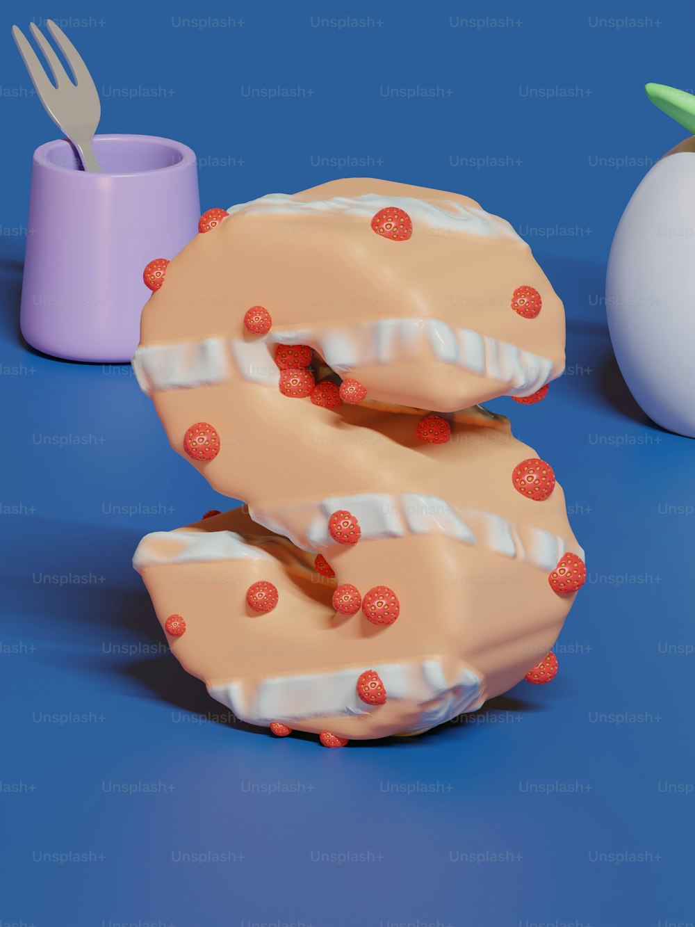 a couple of donuts sitting on top of a table