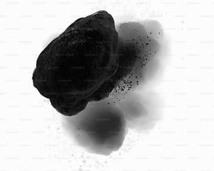 Ein Stück schwarzer Fels, der auf einer weißen Oberfläche sitzt