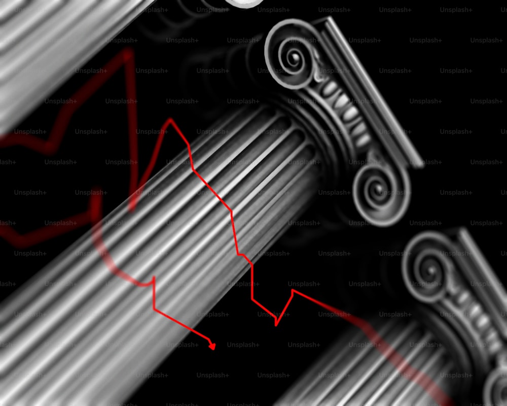 un gros plan d’un objet métallique traversé par une ligne rouge