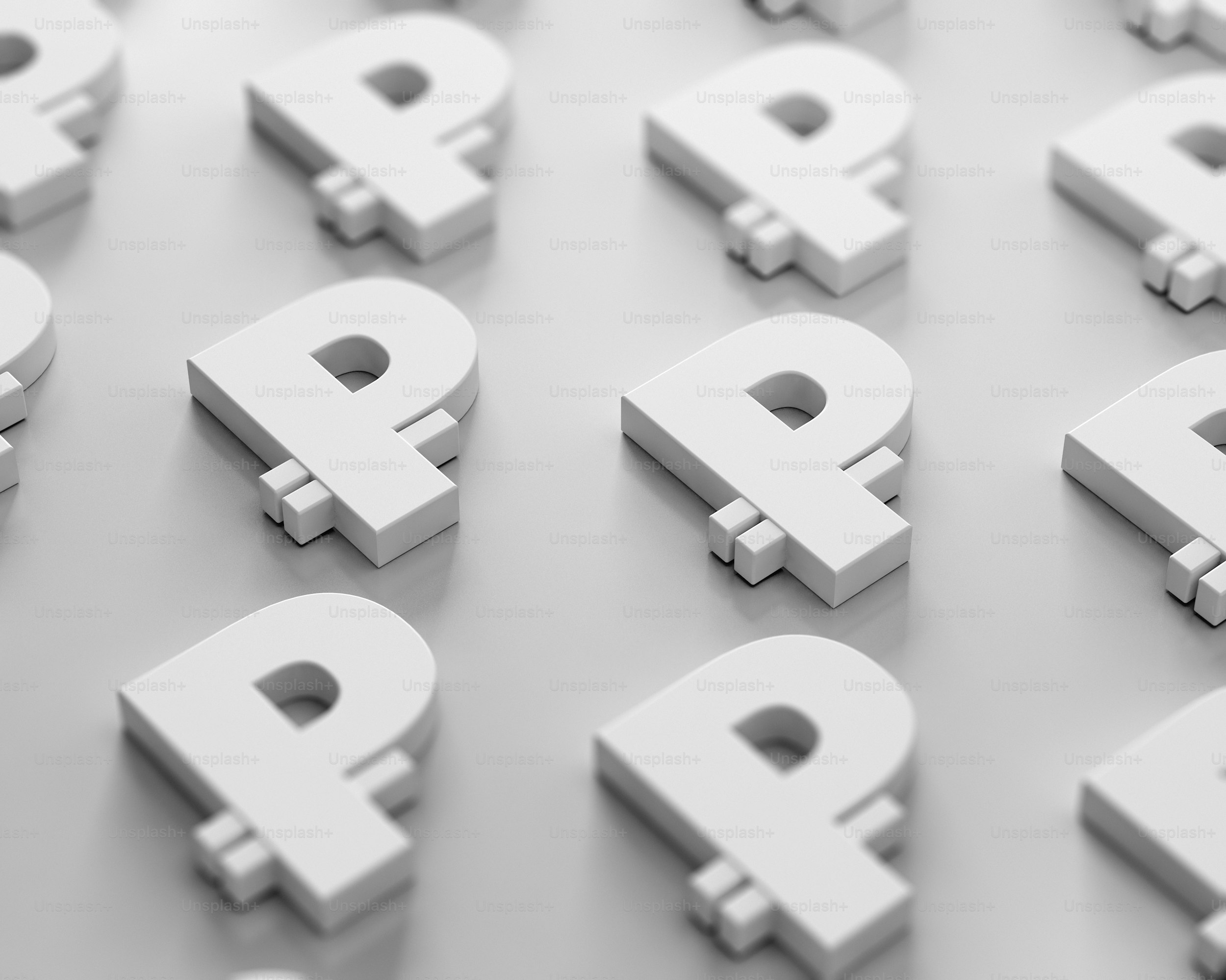 Un gruppo di lettere bianche che si trovano in cima a una tabella