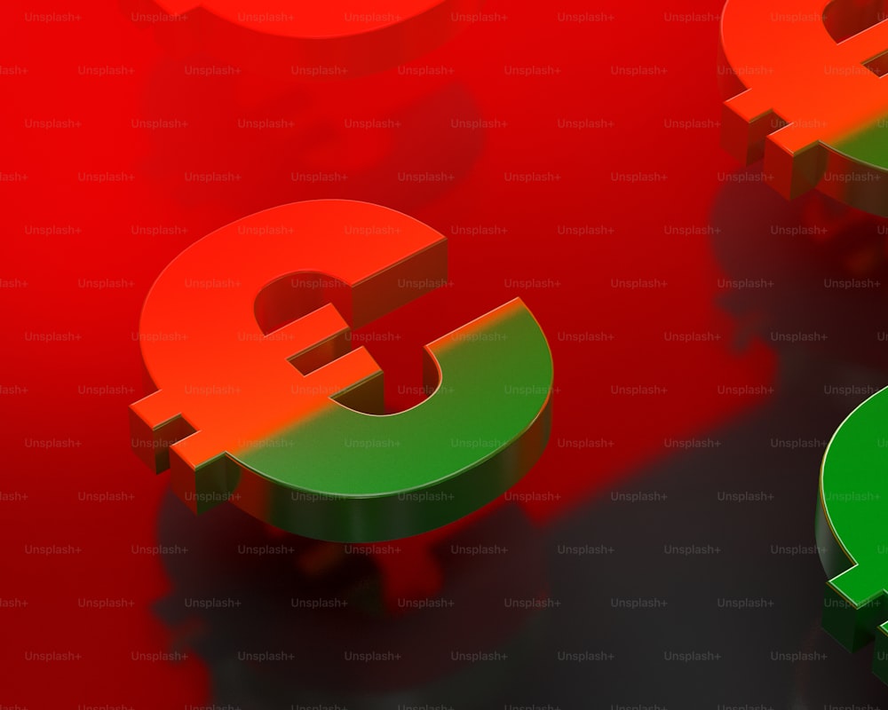 Un simbolo di valuta rosso e verde su sfondo rosso