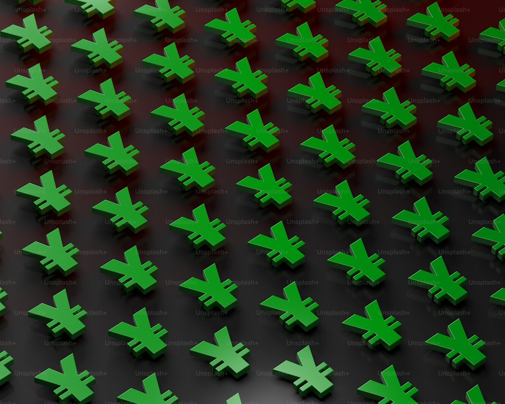 a large group of green crosses on a black surface