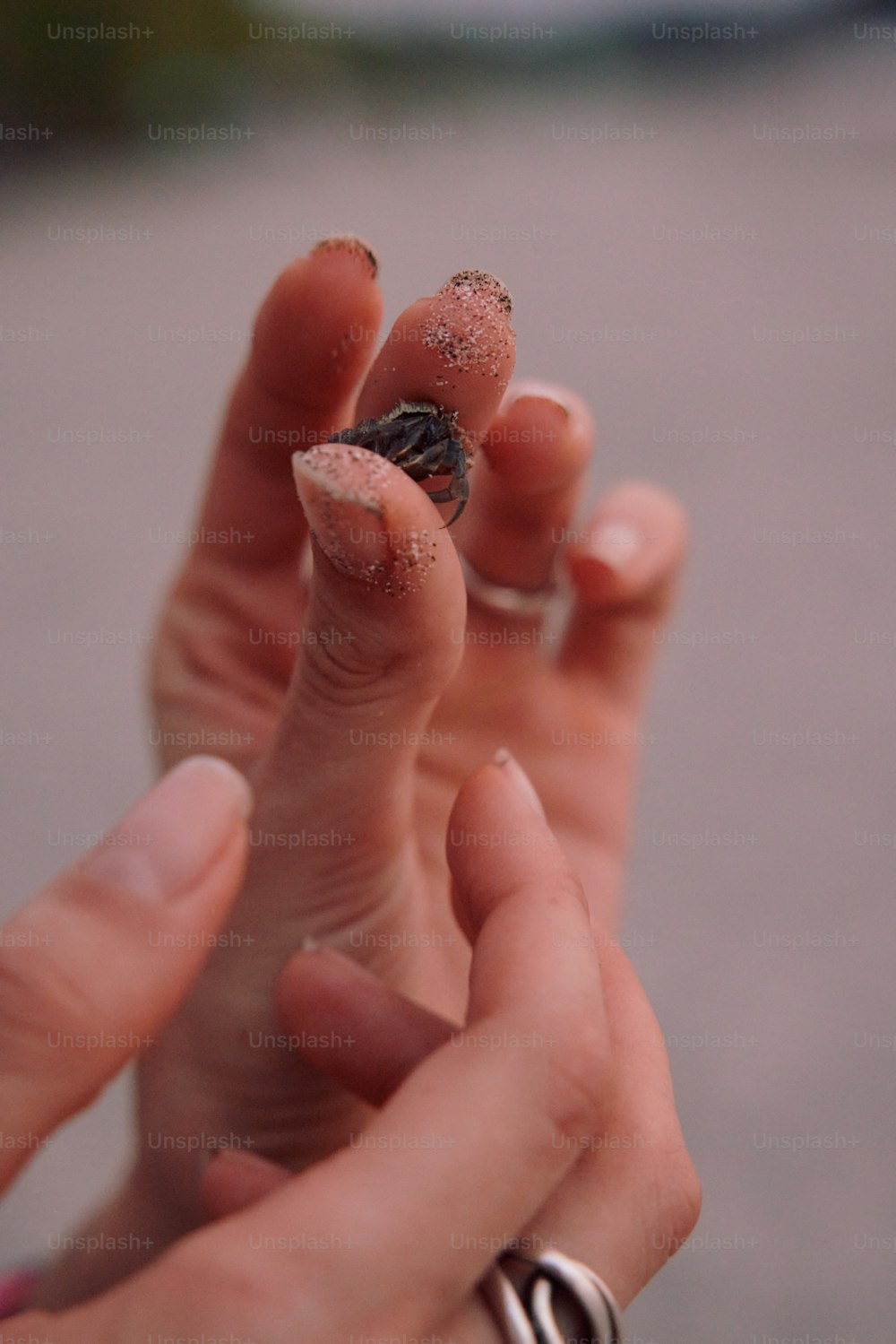 a close up of a person holding a cell phone